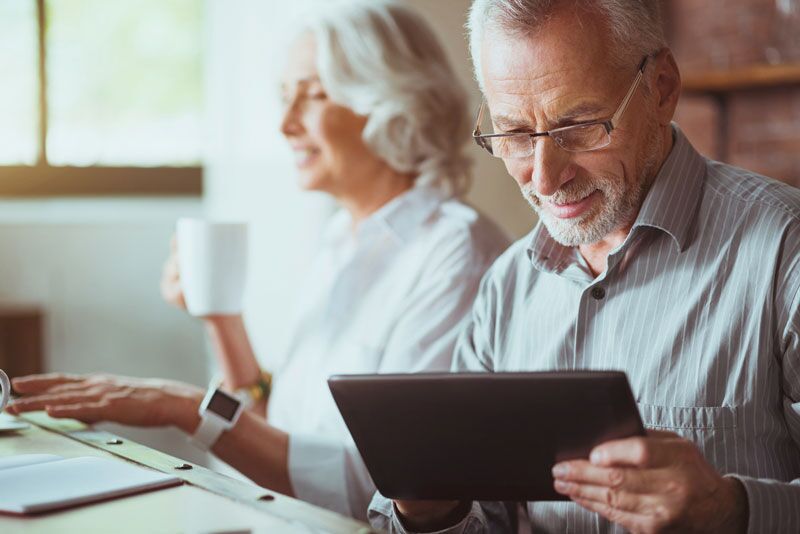 elderly couple at work, implications of a rapidly aging higher education workforce