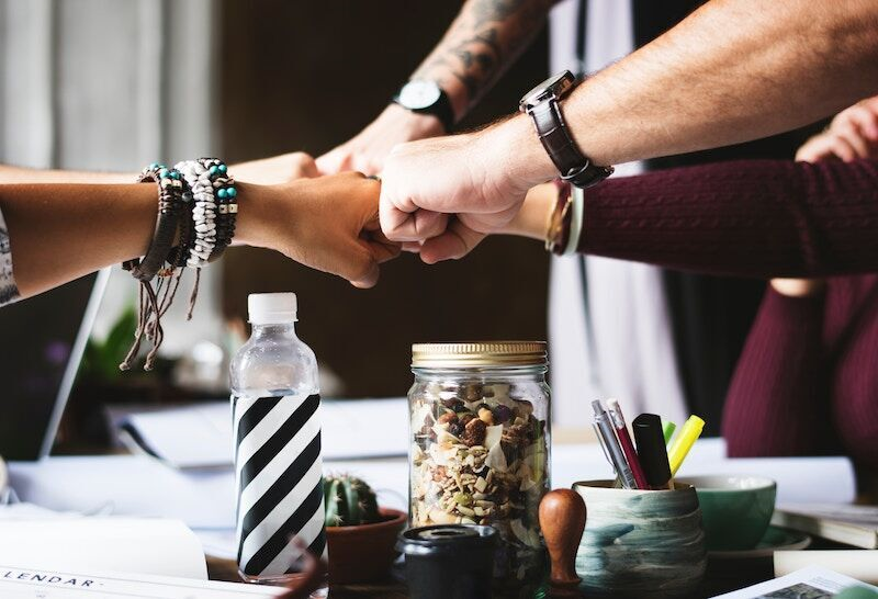 faculty meeting fist bump, how community college leaders can play a role in faculty-led student success initiatives